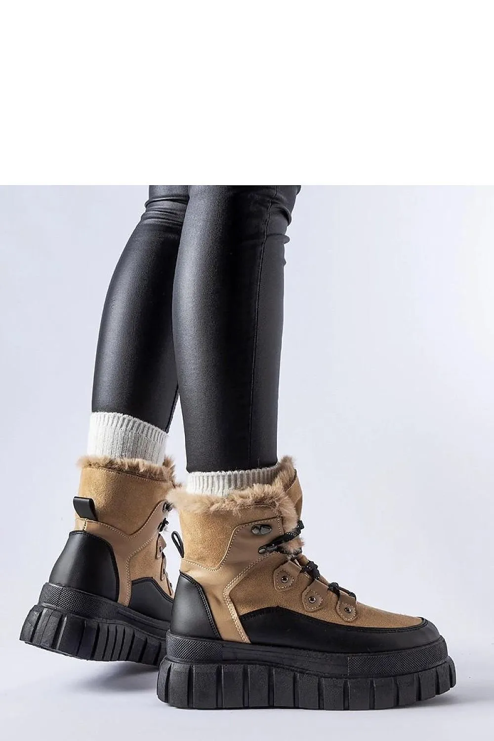 Beige ankle boots with a massive sole