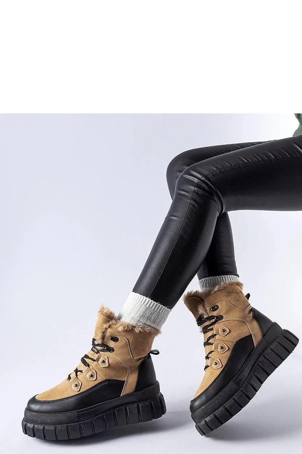 Beige ankle boots with a massive sole